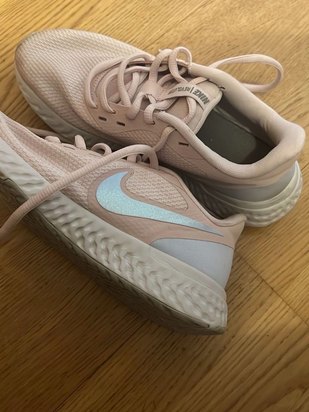 Nike Women's Light Pink Running Sneakers with Iridescent Swoosh